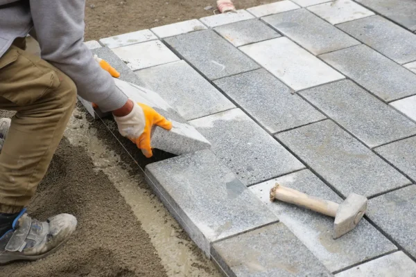 laying-concrete-bricks-on-each-other-for-building-2026-03-16-03-23-14-utc (1)